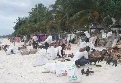 Polishing the carvings at the start of the day