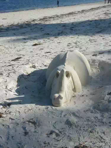 Sand artist crafting Mombasa beach