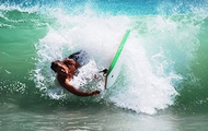 surfing the waves in Bali