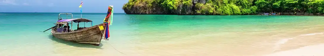 Beach and fishing boat on Phuket beach