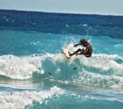 Surfing at Boston Bay