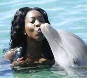 Dolphins kissing me in Dolphin Cove Ocho Rios Jamaica