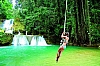 Bungy rope jumping into pool at YS falls in Jamaica