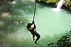 Rope jumping at YS Falls in Jamaica