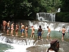 Tourists crossing the YS falls in St Ann Jamaica