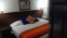 the orange quit bedroom