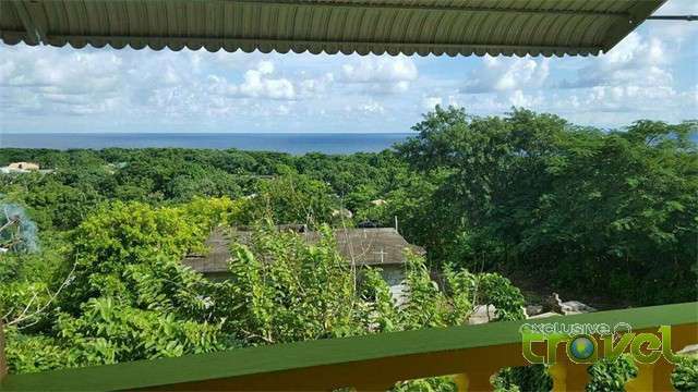 akee tree guest house balcony view