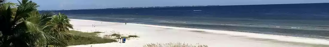 Panorama image of white sand beach in Naples Florida